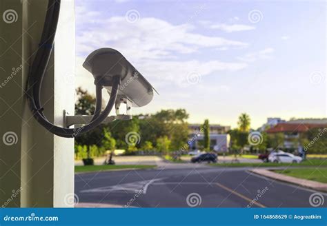 Cctv Camera Security At Outdoor Parking Lot With Copy Space For Text