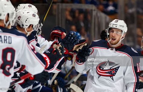 Pierre Luc Dubois Of The Columbus Blue Jackets Is Congratulated By