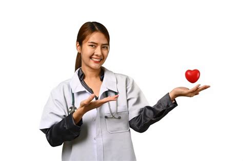 Premium Ai Image Image Of Female Doctor Holding Stethoscope And Red