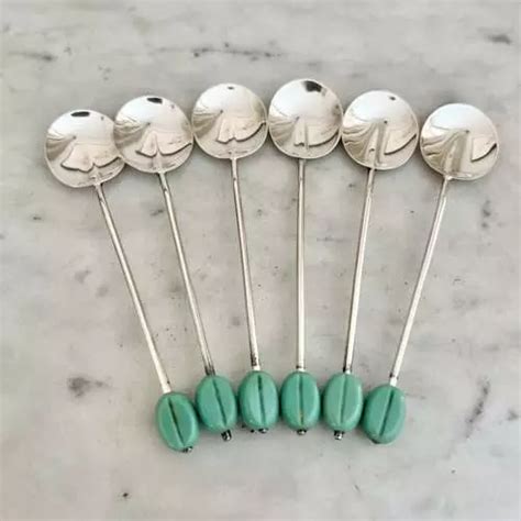 Set Of Green Coffee Bean Sterling Silver Spoons Dated In Antique