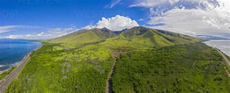 Aerial View Over West Maui Mountains And Pacific Ocean With Puu Kukui