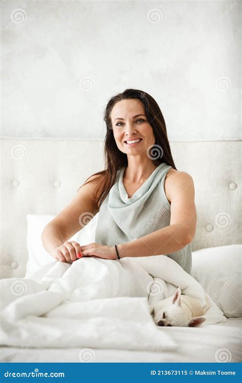 Lazy Morning Concept Beautiful Happy Woman Wakes Up In Bed And