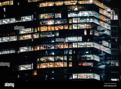 Office building with glass facade - night photograph Stock Photo - Alamy