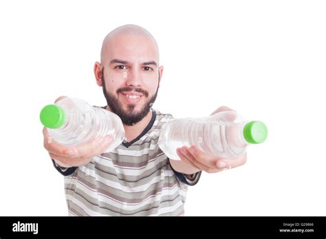 Smiling Man Offering Or Giving Two Bottles Of Cold Water As Hydration