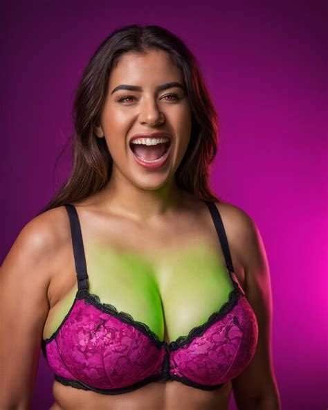 Premium Photo A Woman In A Pink Bra With Green Paint On Her Face