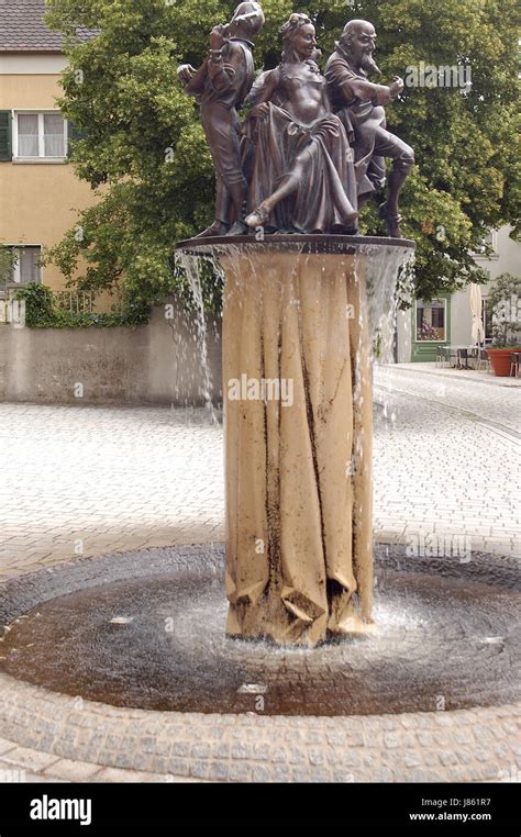 castle courtyard player fountain in red Stock Photo - Alamy