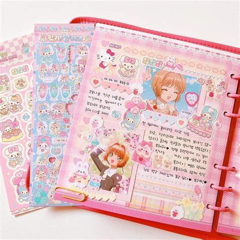 Three Notebooks With Cartoon Characters On Them