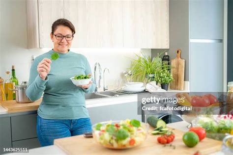 Mature Woman Spinach Photos And Premium High Res Pictures Getty Images