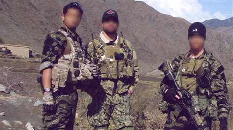 Seal Team Six Devgru Operators Wearing A Tiger Stripe Pattern During