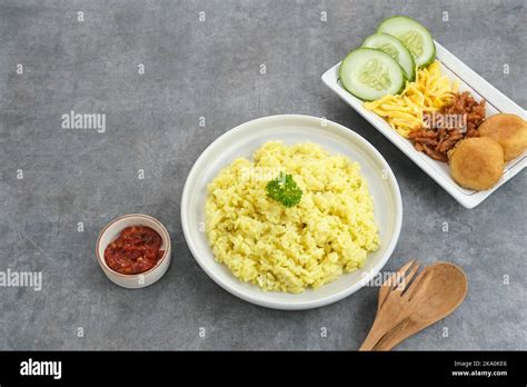 Nasi Kuning Indonesian Traditional Food Made From Rice Cooked With Turmeric And Coconut Milk