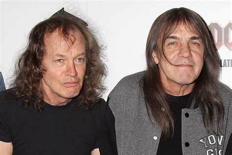 Angus Young Explains How AC/DC Decided To Continue After The Death Of ...