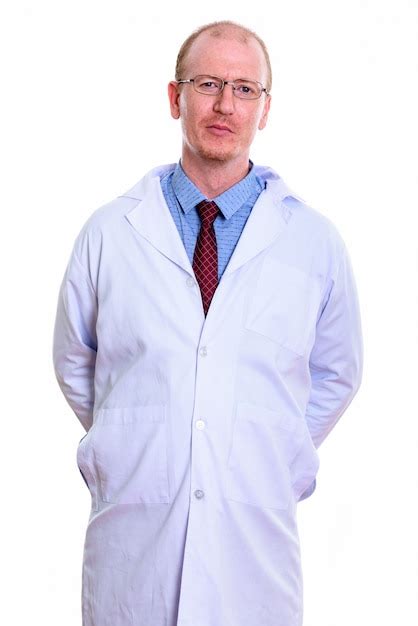 premium photo man doctor standing isolated  white