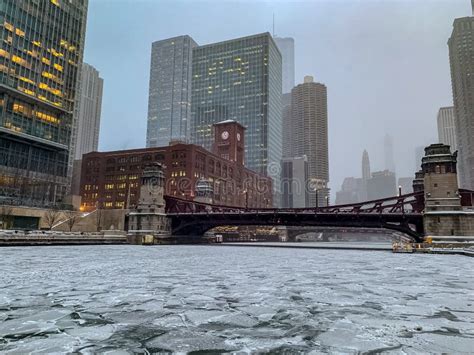 Frozen Chicago River In Chicago Loop During January Snowstorm Stock