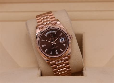 Rolex Day Date 40 Rose Gold Chocolate Baguette Diamond Dial 228235 2023 Box And Papers