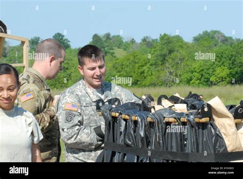 US military army National Guard training and assisting Stock Photo - Alamy