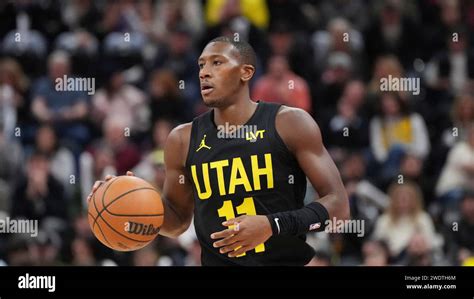 Utah Jazz Guard Kris Dunn Moves The Ball Down Court During The