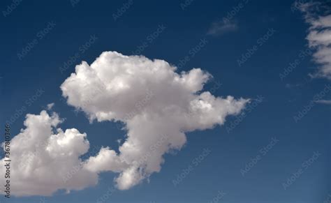 Cumulus Clouds Look Like Fluffy White Cotton Balls In The Sky