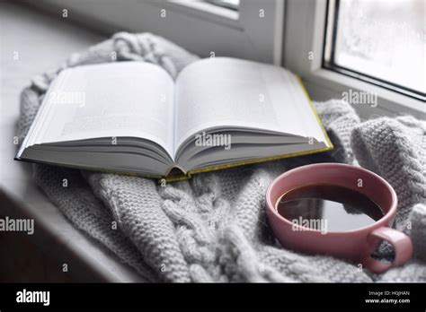 Cozy Home Still Life Cup Of Hot Coffee And Opened Book With Warm Plaid