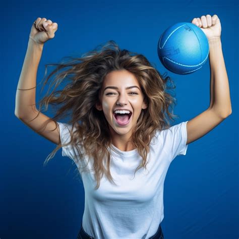 Premium Ai Image Photo Of Excited Sports Fan Girl Holding A Ball