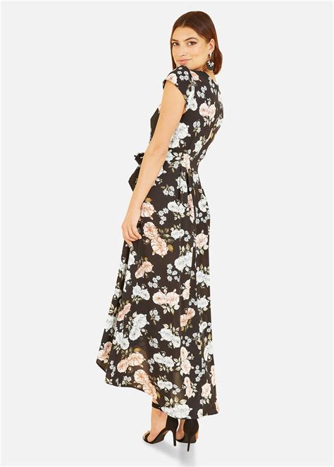 Mela Floral Print Dipped Hem Wrap Dress In Black Matalan