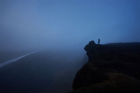 Free Images Sea Coast Rock Ocean Horizon Person Mountain Cloud