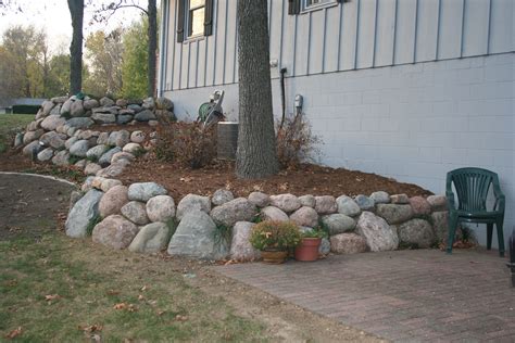 Landscape boulders | Landscaping with boulders, Landscape design, Outdoor