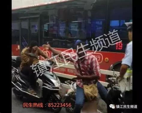 兩名非洲小哥騎電瓶車在大市口闖紅燈，被交警攔下後竟然…… 每日頭條