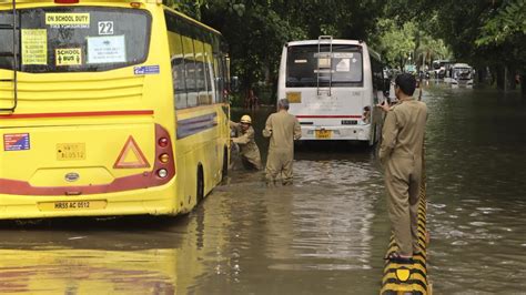 In Photos Waterlogging And Traffic Snarls In Delhi As Rain Lashes