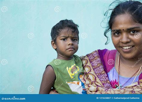 Child With Mother In The Street Of Village Editorial Photography