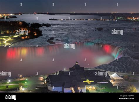 Colorful lights on Niagara Falls at night, Canada Stock Photo - Alamy