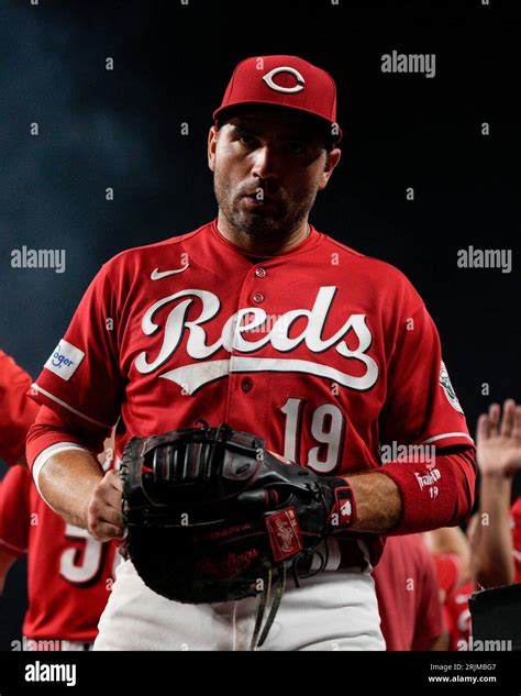 Cincinnati Reds First Baseman Joey Votto 19 Walks Into The Dugout Following A Baseball Game