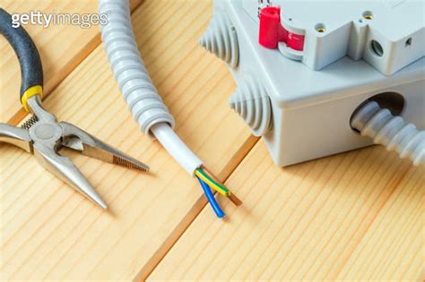 Junction Box With Wire And Tool For Repairing Electrics In The House