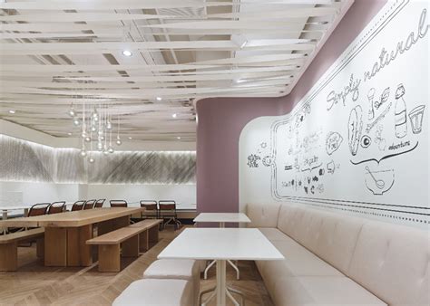 Ippolito Fleitz Group Installs Metal Trees In Natural Food Restaurant