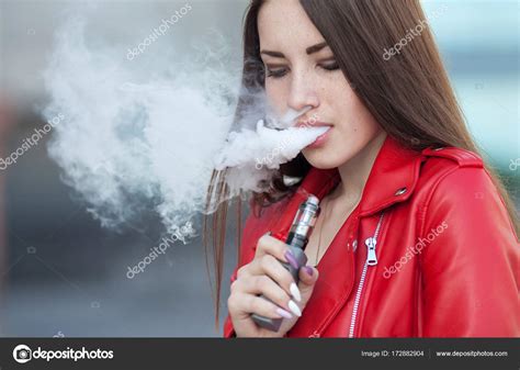 Beautiful Woman Smoking Vaping Cigarette Smoke Outdoors Vaping Concept