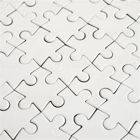 Close Up Of A White Jigsaw Puzzle In Assembled State In Perspective