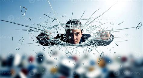 Determined businesswoman breaking through glass ceiling, symbolizing