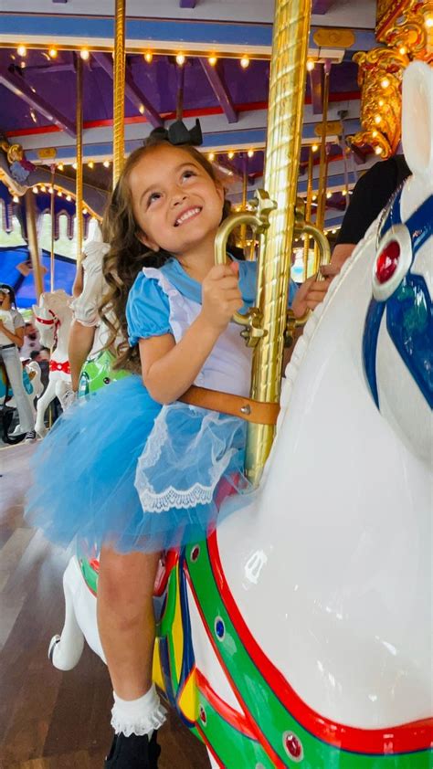 Disneyland carousel in 2022 | Alice in wonderland outfit, Disneyland ...