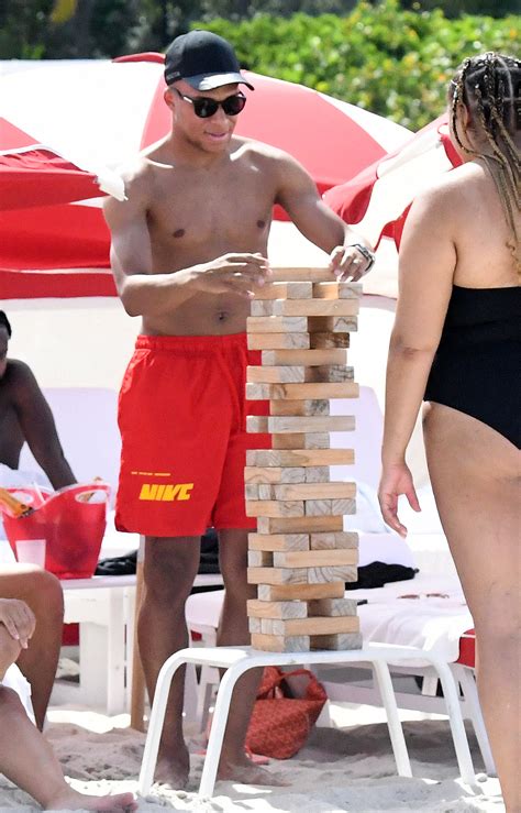 Kylian Mbappe Brushes Off Transfer Rumours As He Plays Giant Jenga On A