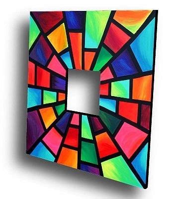 A Colorful Light Switch Plate Cover With An Abstract Stained Glass