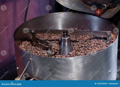 Worker Roasting Cocoa Beans in a Chocolate Making Factory Stock Photo ...