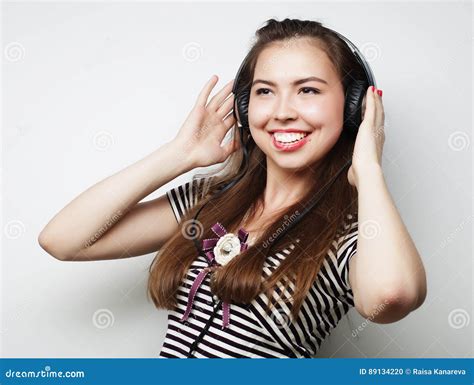 Woman With Headphones Listening Music Music Girl Dancing Agains Stock