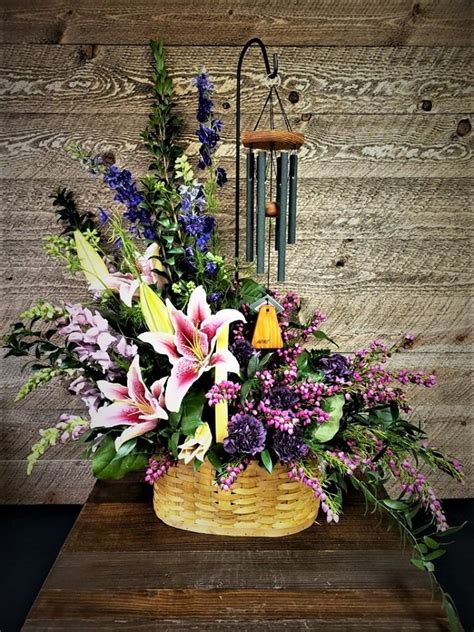 Asymmetrical Remembrance | Basket flower arrangements, Funeral floral ...