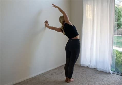 Side Bend — 30 Seconds Per Side Wall Stretches To Relieve Back Pain