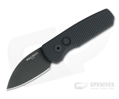 protech runt  automatic wharncliffe blackout dlc cv textured