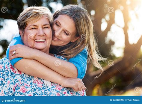When Shes Happy Im Happy Portrait Of A Happy Mature Woman Hugging Her Mother Outdoors Stock