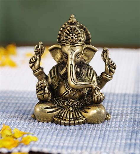 Buy Ganesh 4 Hands Golden Brass Religious Idol By Imli Street At 24