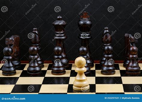 Wooden Chess One White Pawn Against All Black Pieces Chess Pieces Are