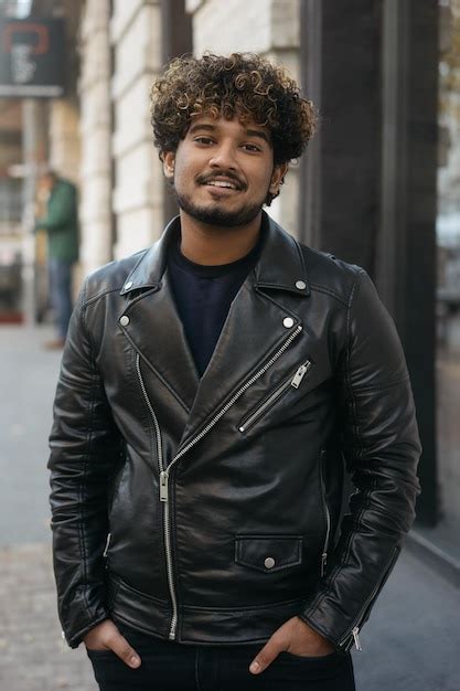 Premium Photo Smiling Handsome Indian Fashion Model Wearing Black Leather Jacket Posing For