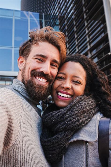 Vertical Portrait Of Young Multiracial Couple Man And Woman Tourist