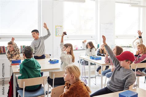 Children sitting in classroom Stock Photo | Adobe Stock